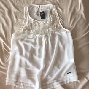 White tank with floral pattern